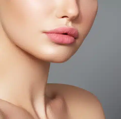 A closeup image of a woman's lips having a perfect shape from lip fillers, a service offered at Emana Medical.